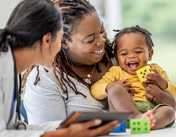 Nevada Early Childhood Advisory Council Home Page Parents Parent and child playing with blocks