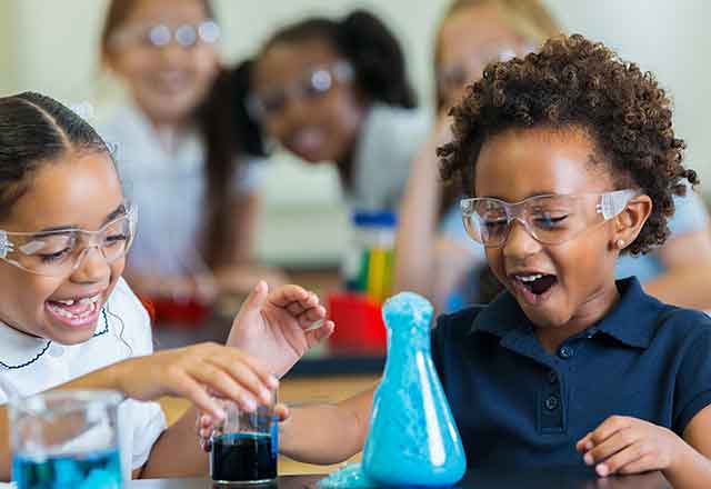 Nevada ECAC Hot Topics Family Resources Children conducting a hands-on science experiment