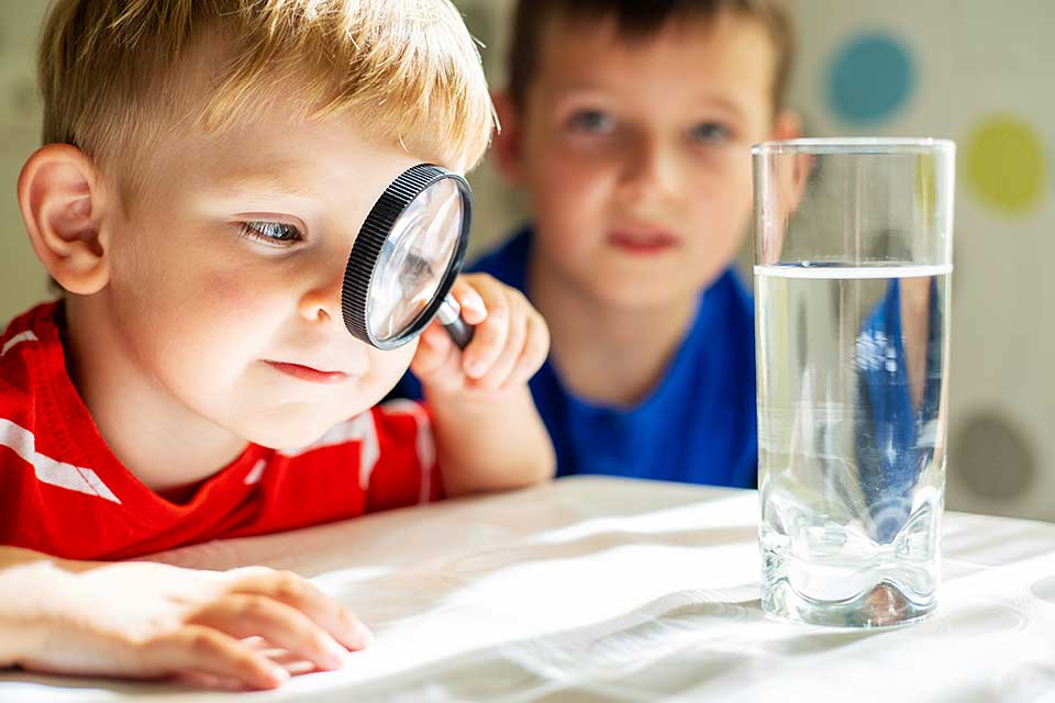 Children conducting a classroom science experiment