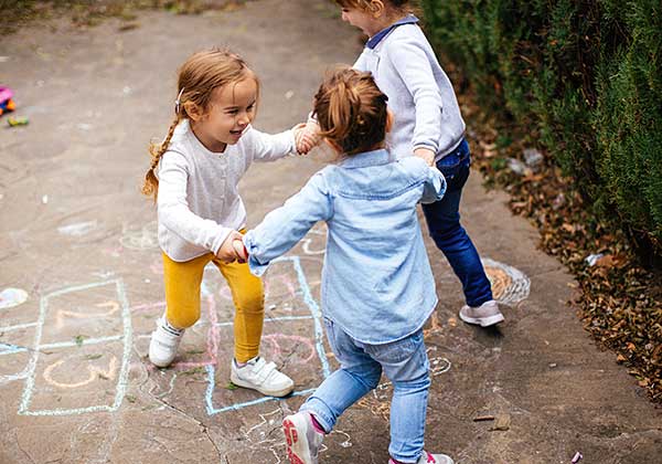 Toddler walking outdoors