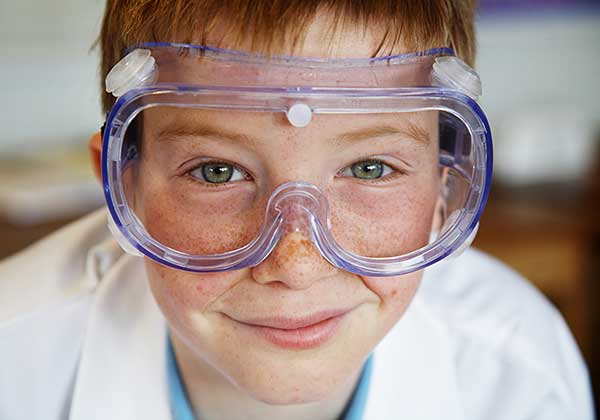 Nevada ECAC Subcommittees Workforce Development Calendar 2 Smiling child wearing protective goggles
